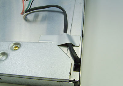 Conductive adhesive tape attached to metal frame