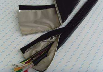RF/EMI shielding cable jacket - conductive fabric